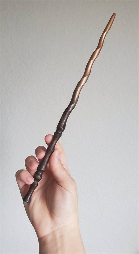 Charger for a wand with magical abilities